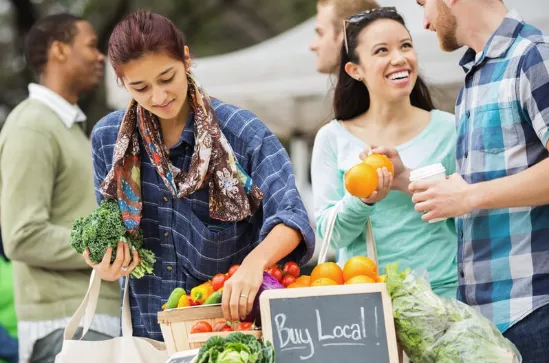 Small town entrepreneurs networking in a farmer's market