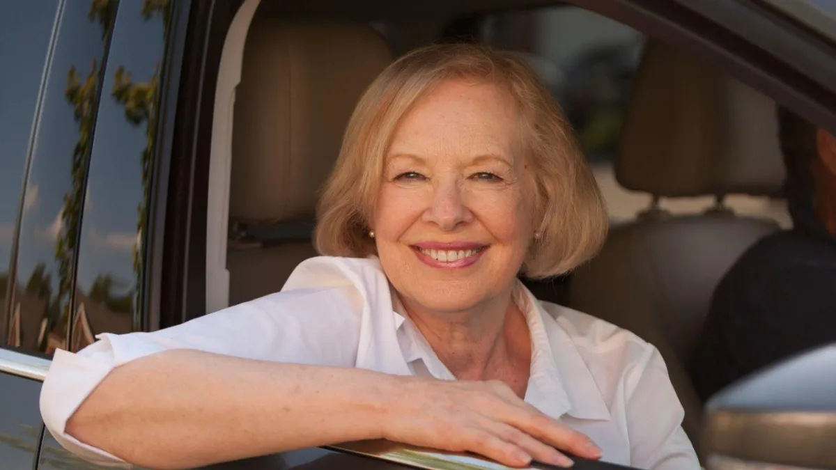 senior with dementia sitting in a car