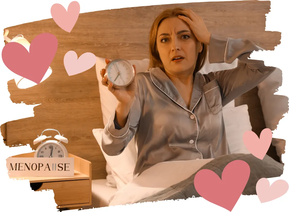 Middle-aged woman sitting up in bed in the middle of the night, looking tired and staring at her bedside clock, struggling with insomnia during perimenopause.