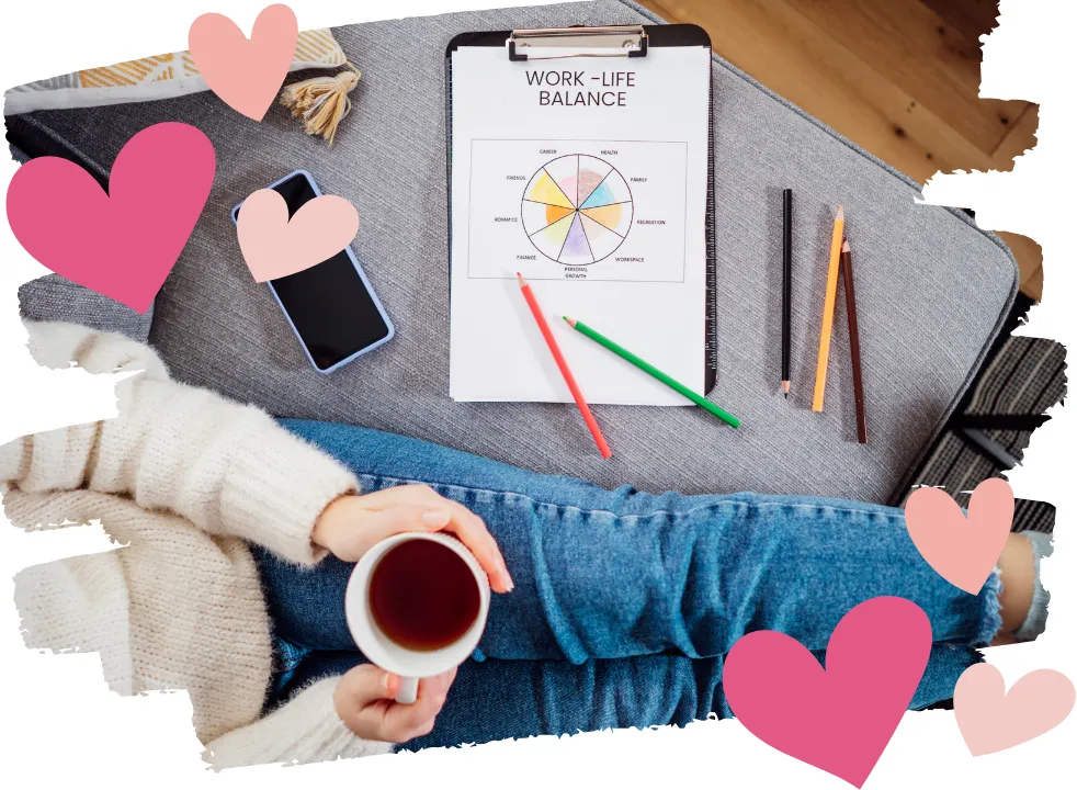 Image of a midlife woman sipping tea while seated at a desk with a clipboard labeled "Work/Life Balance," symbolizing calm focus and intentional living during perimenopause.