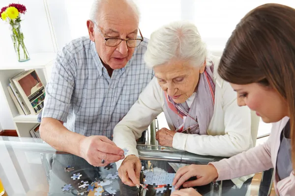 Senior enjoying a morning puzzle session with coffee