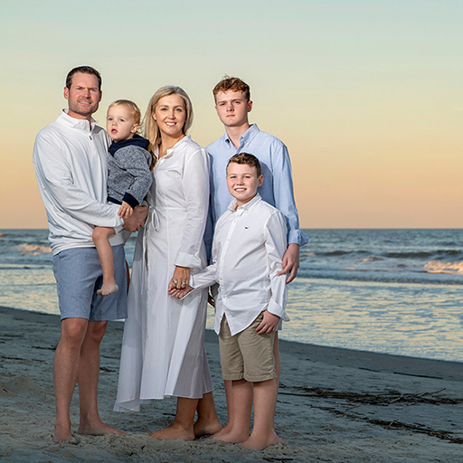 Hilton Head family beach photographer capturing a sunset portrait session for a visiting family on Hilton Head Island.
