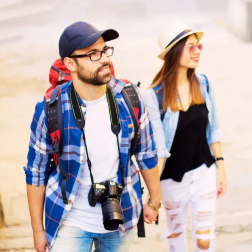 A couple enjoying themselves on a walking tour of San Antonio