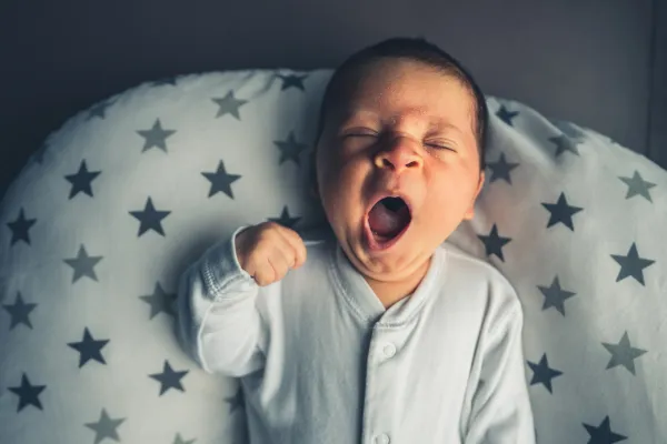 Peaceful baby sleeping after sleep consultation intervention