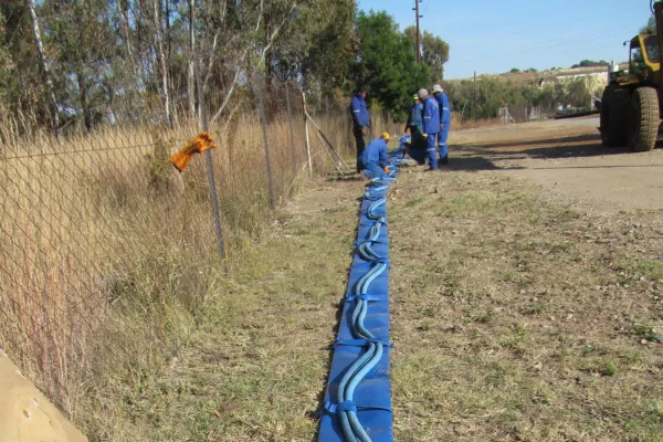 labourers with irrigation system