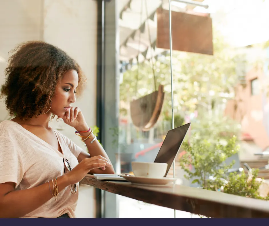 Black woman sitting at desk