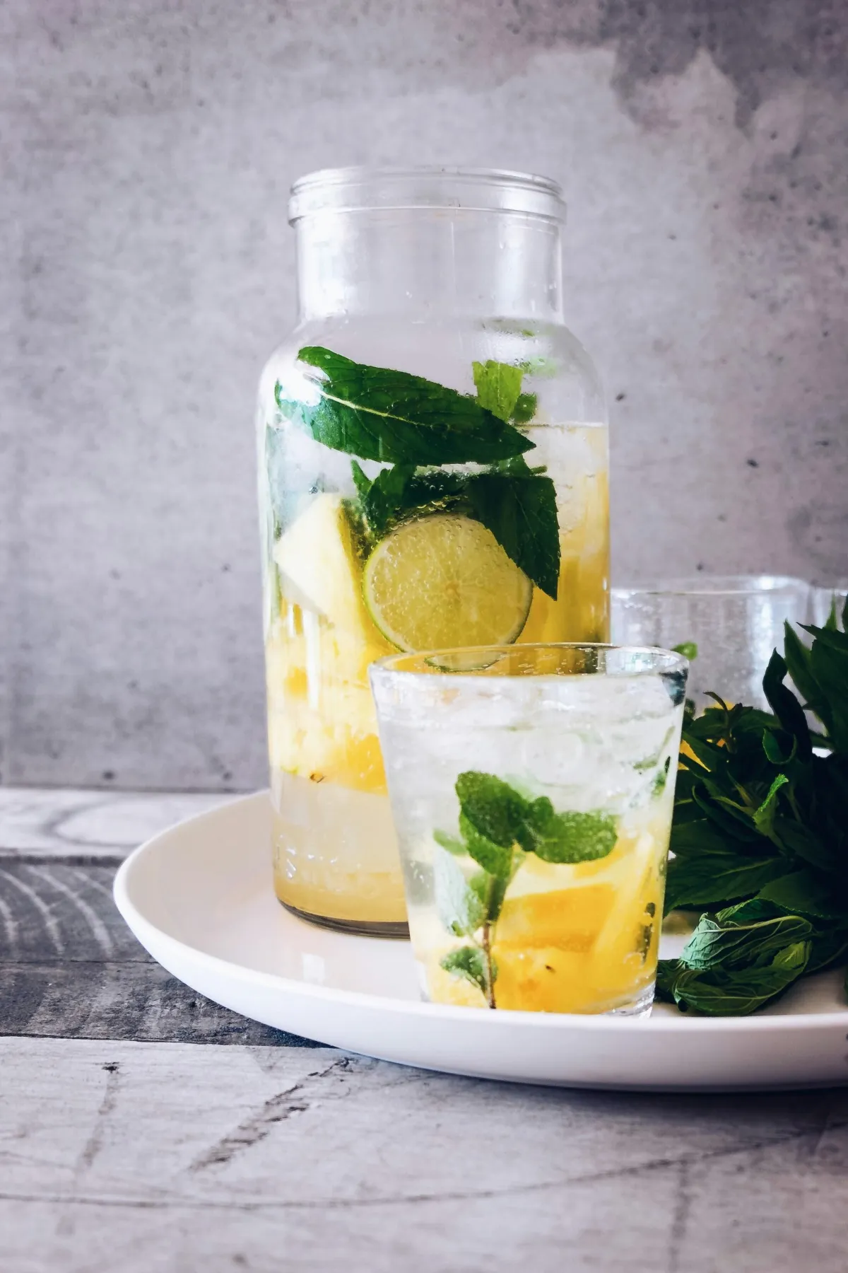 Water pitcher filled with lemon