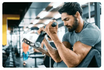 Professional strength and conditioning coach training an athlete with proper technique and performance focused guidance