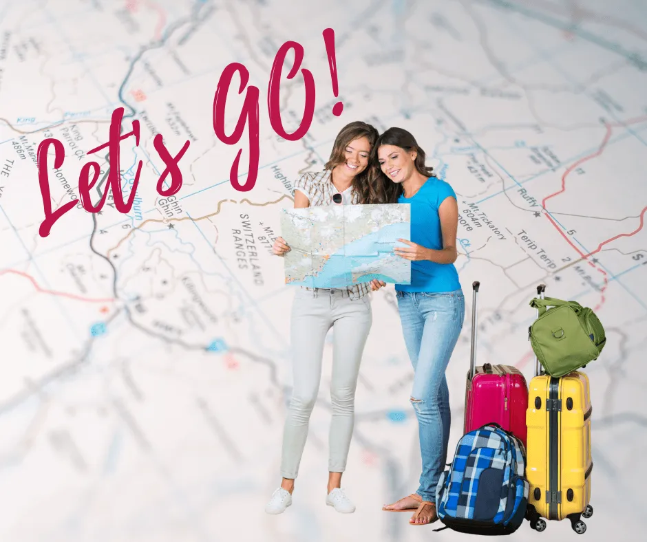 Two women with a map and suitcases