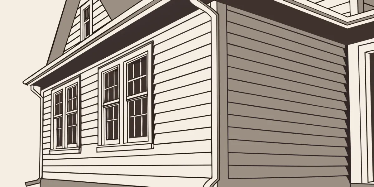 A home with new vinyl siding, a key factor in the total installation cost.