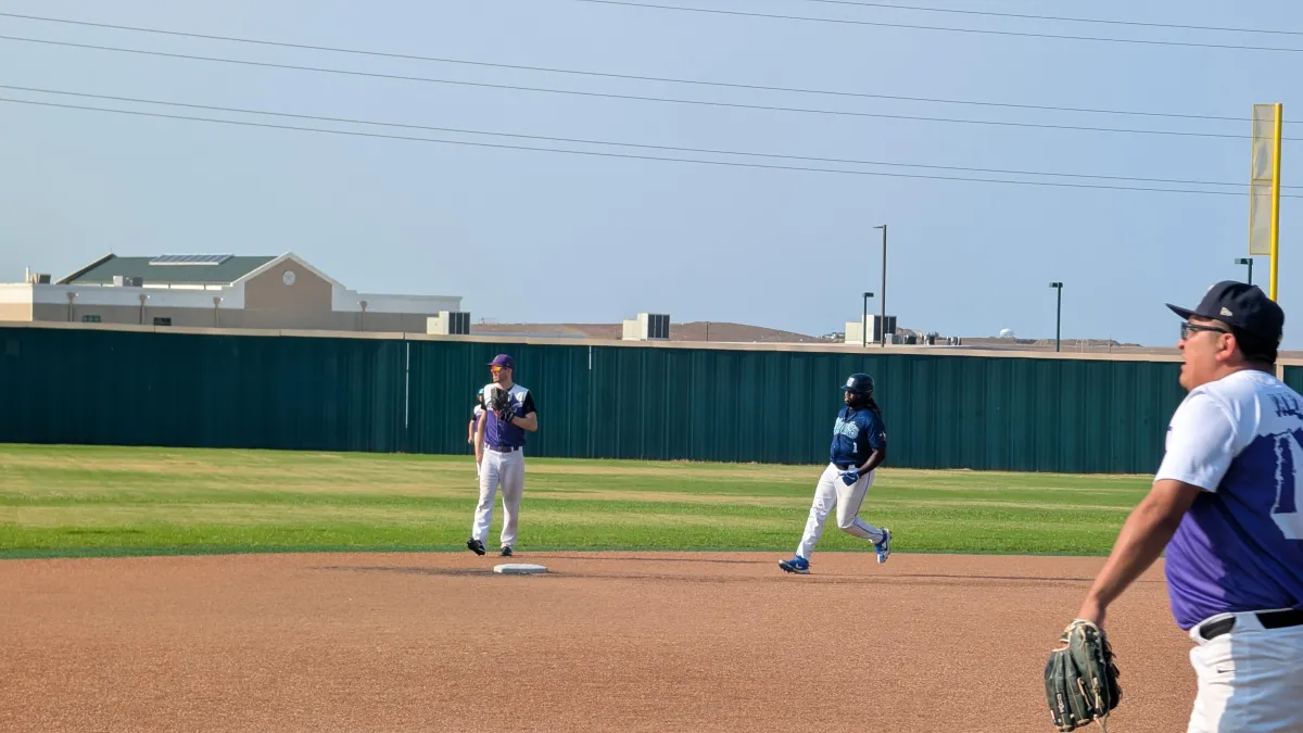 Josh Hopkins runs to second base