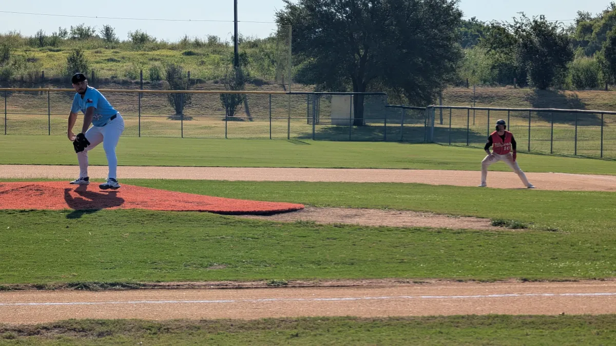Gabe Torres on the mound throwing a pitch