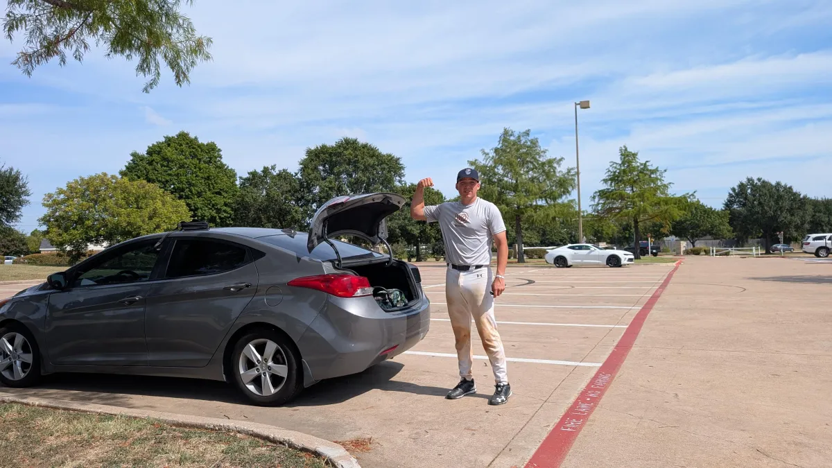 Danny by his car