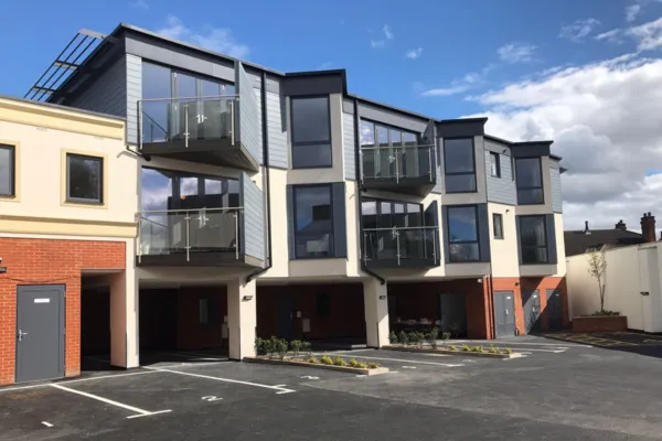 Image of a modern apartment complex built on the site of a derelict former bus garage in Watford
