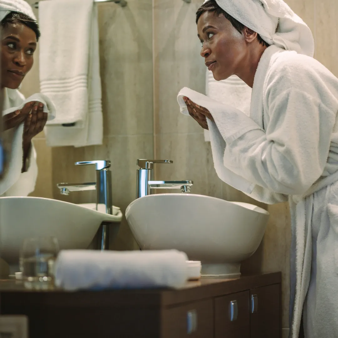 woman washing face