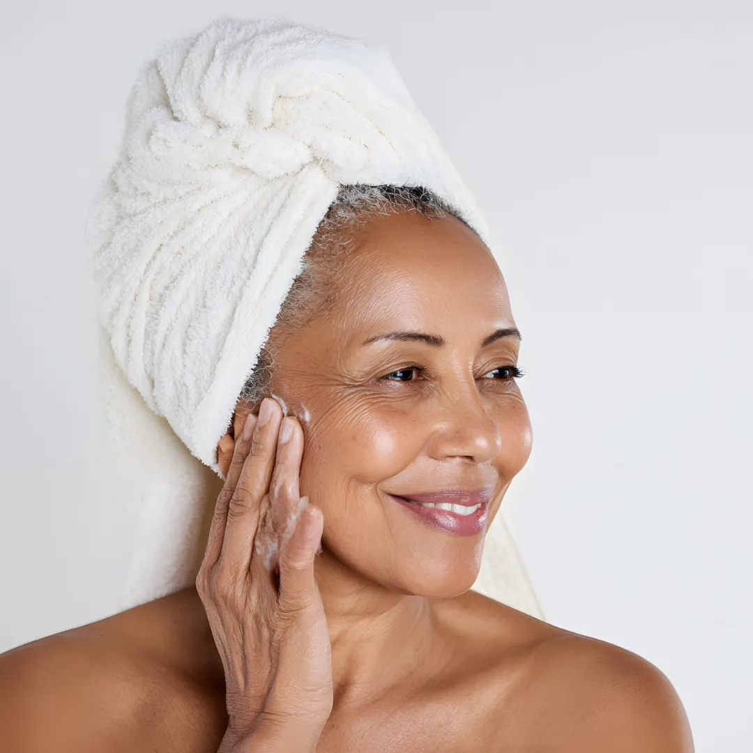 mature woman with towel wrapped hair