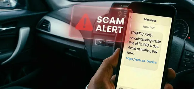 An image of a phone with a scam sms message on it's screen