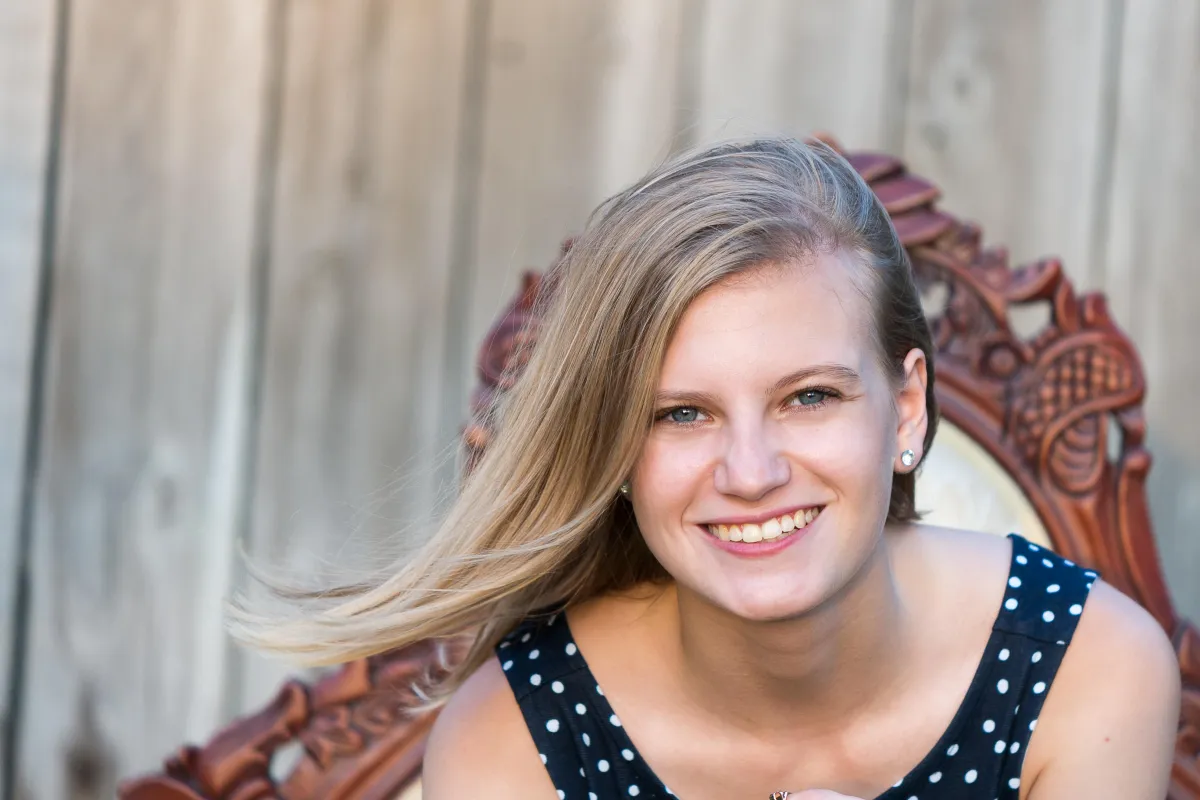 St. Louis Family Photographer face of child sitting on chair