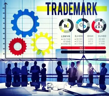 The word trademark with digital graphs and charts