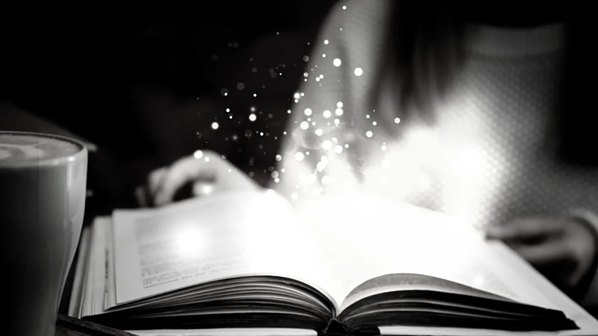 An open glowing book that means words are magical
