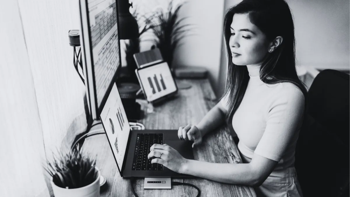 A Lady in front of her computer working