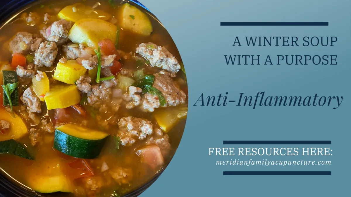 A warm bowl of anti-inflammatory winter soup made with ground beef, carrots, celery, tomatoes, and fresh herbs