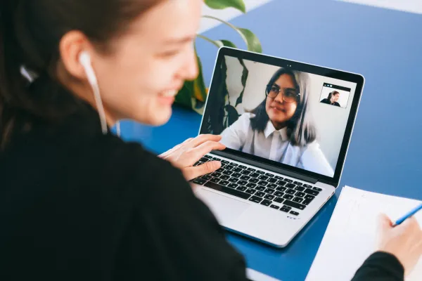 A laptop screen displaying an online notary session, making document signing quick and easy.