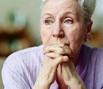 woman grieving and thinking