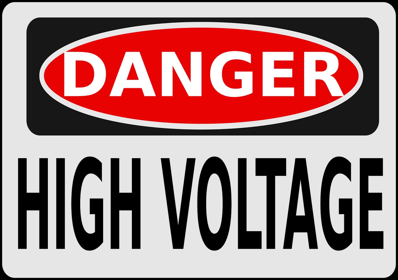 a warning sign that says "Danger High Voltage" 