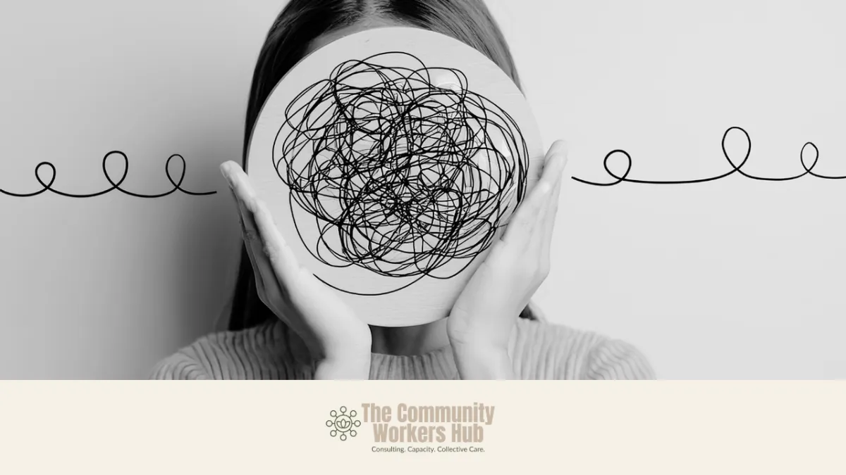 A person holds a circular card in front of their face covered in tangled, scribbled lines, obscuring their features. Simple looping lines extend outward on either side. The black-and-white image symbolises mental overwhelm, emotional complexity, or developmental trauma. The Community Workers Hub logo appears at the bottom of the image.