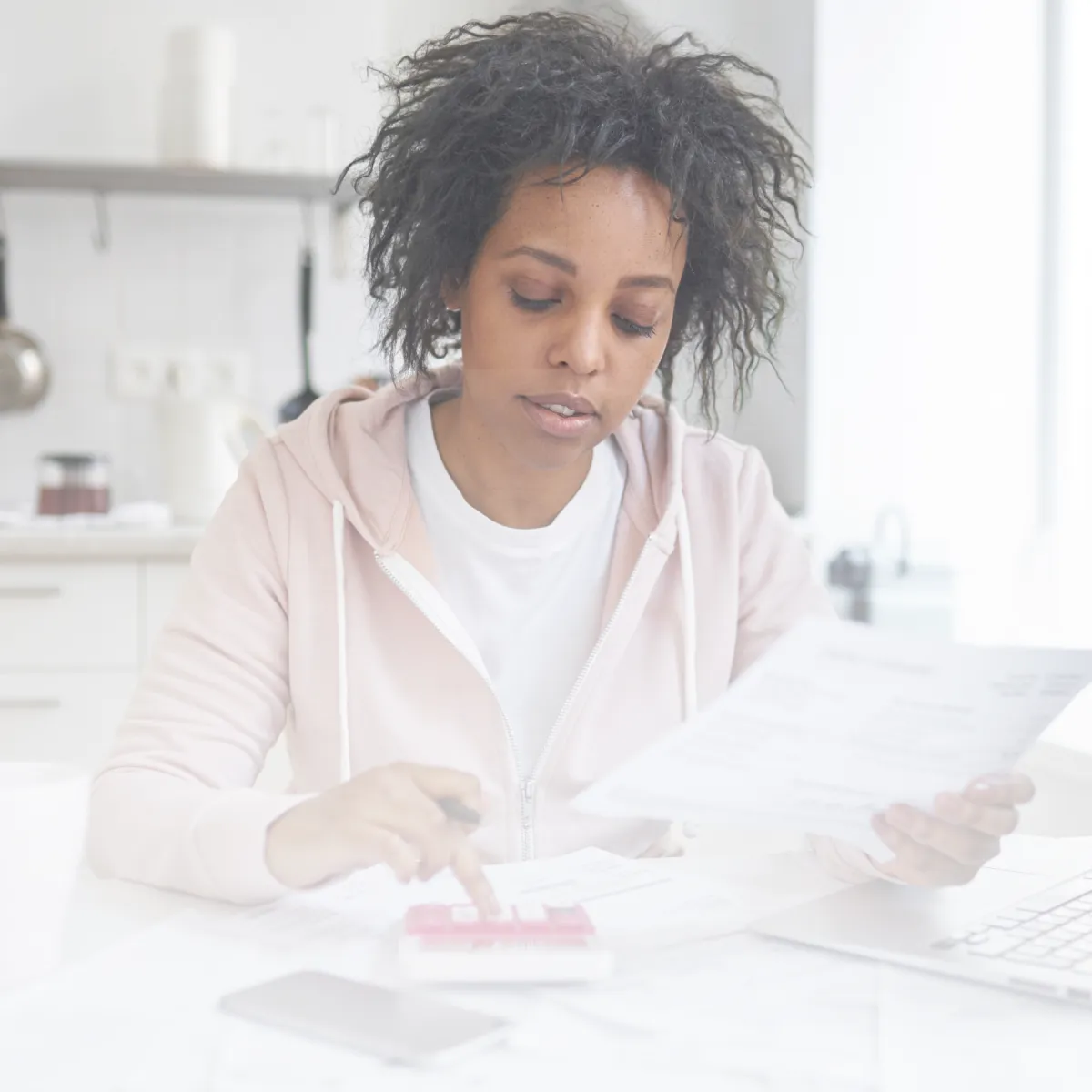 Image of woman frustrated with financial trauma