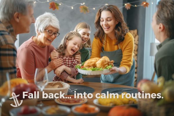 A family laughing together during a cozy holiday meal, representing calm connection and emotional balance.