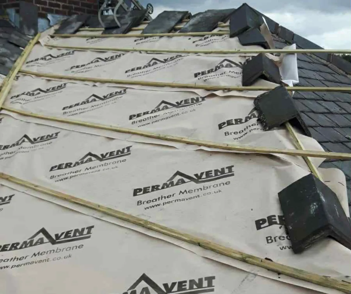 Breathable roofing membrane installation during roof replacement in Lancashire