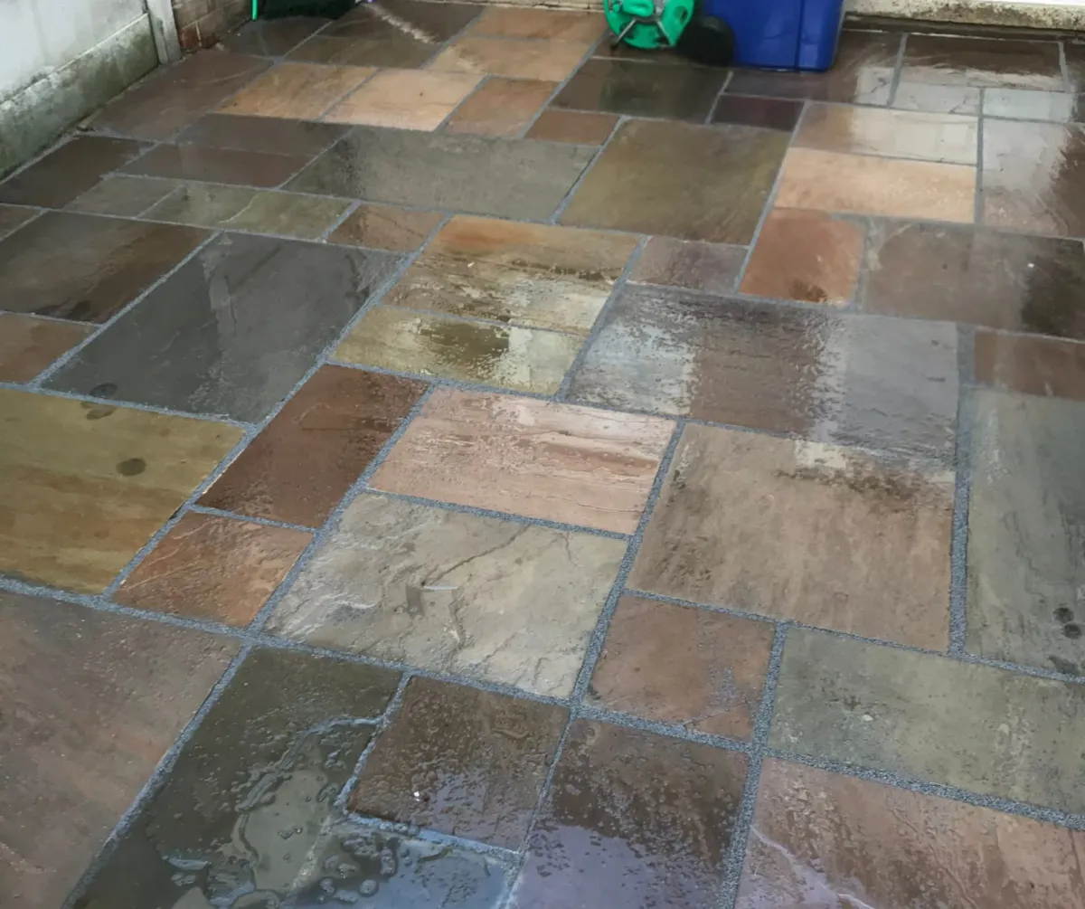 Natural stone patio paving installation in Lancashire garden