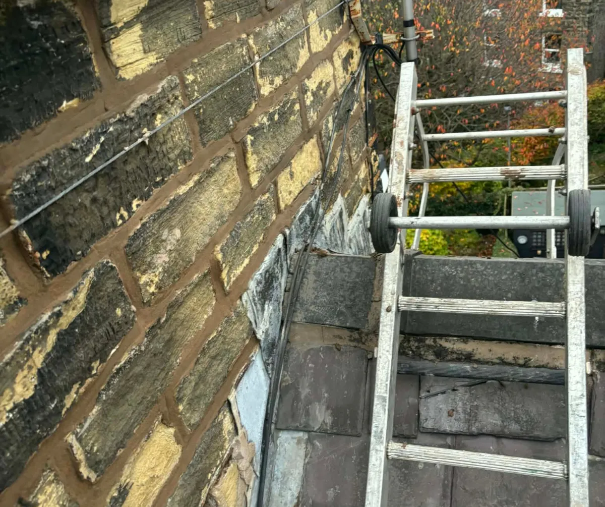 Brickwork repair and roofline maintenance on property in Lancashire