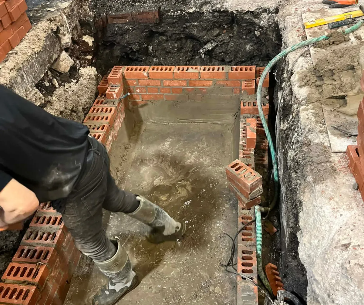 Concrete foundation base preparation for building work in Lancashire