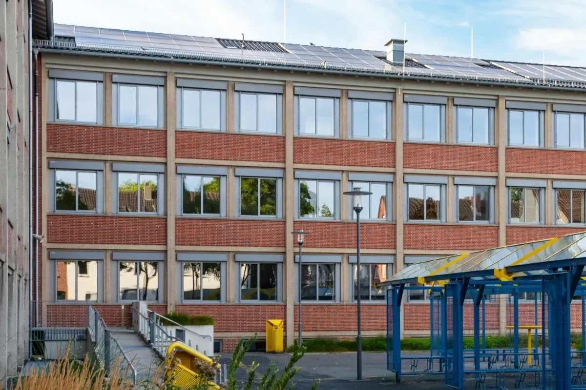 Roof Mounted solar panels on a school building in Manchester