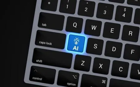 Keyboard with one key lit up that says "AI"