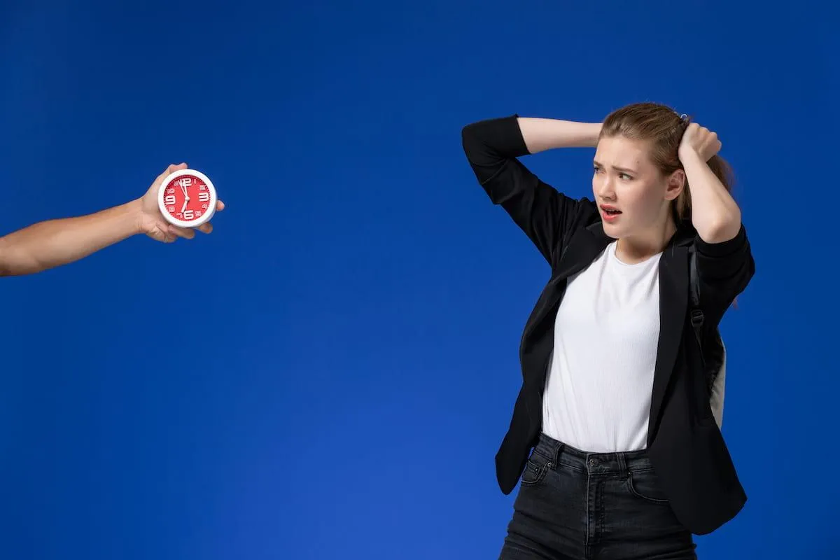 female professional panicking due to false urgency from all her work