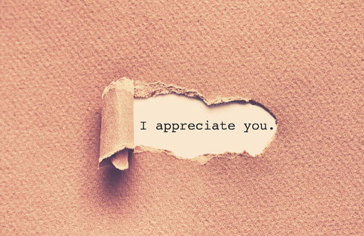 Paper torn away revealing "I appreciate you"