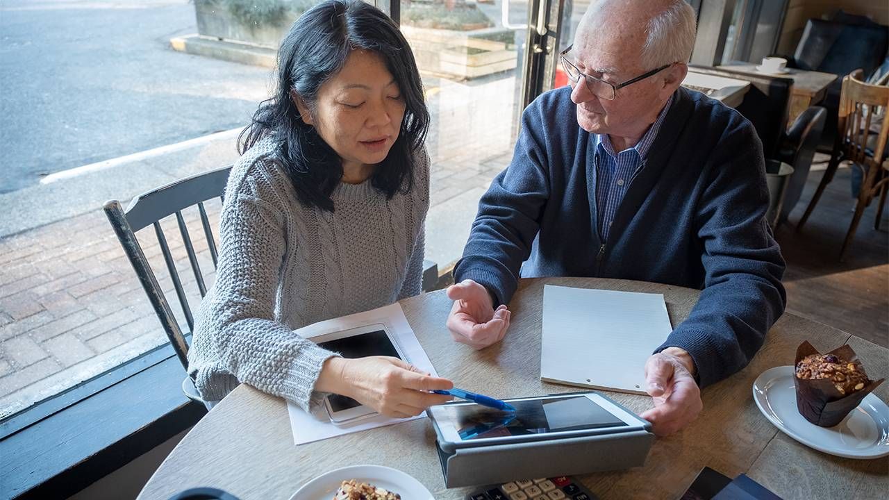 Man and woman discussing finances