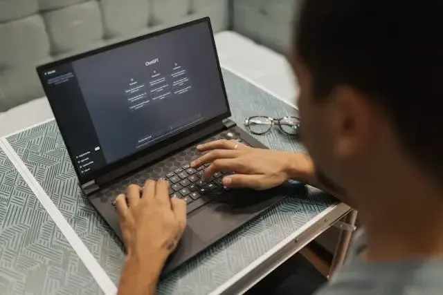 how is ai automation transforming businesses: a person using ChatGPT for his daily works