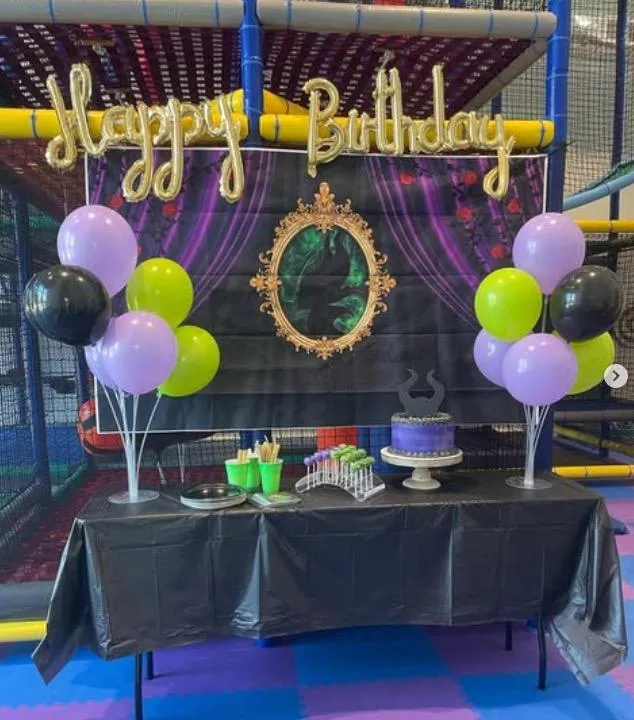 Maleficent birthday party setup with themed decorations at Wild Child indoor playground in Bastrop, TX
