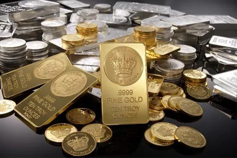 Gold bars and collectible coins on display – Mid Valley Pawn