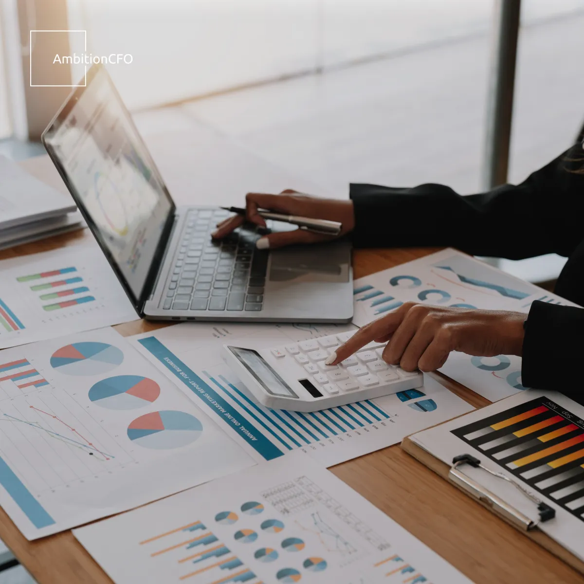 Cover image showing charts, graphs, and financial data visuals representing key business metrics.
