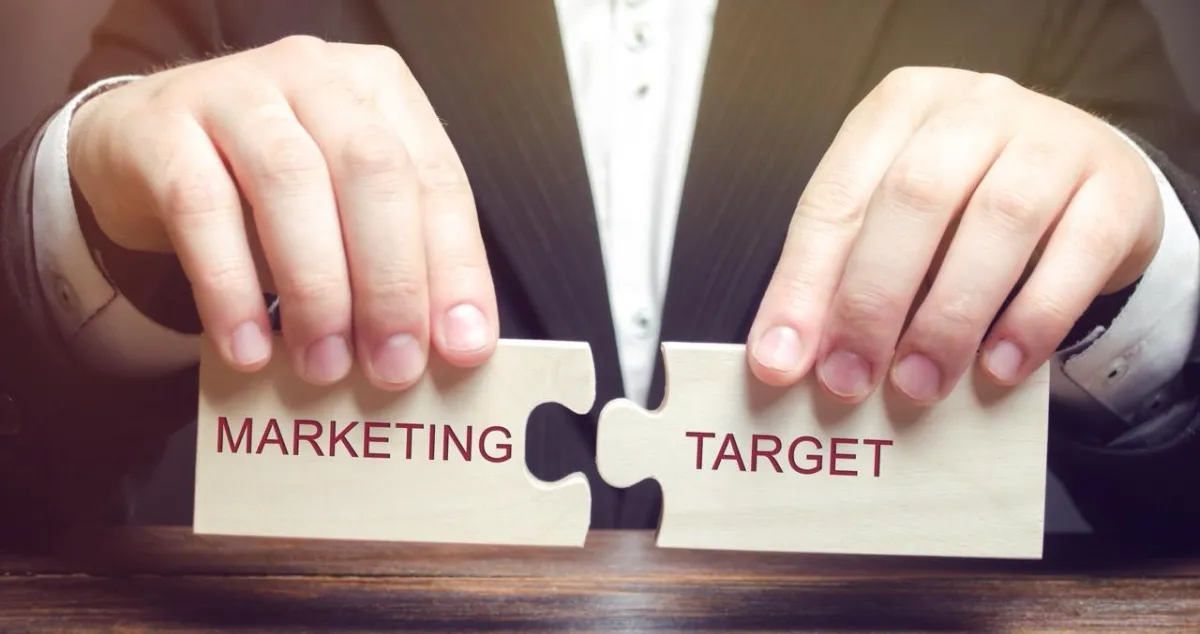 One-to-One Targeting Across Search, Social, and Email-businessman-collects-wooden-puzzles-with-the-word-2025 Large