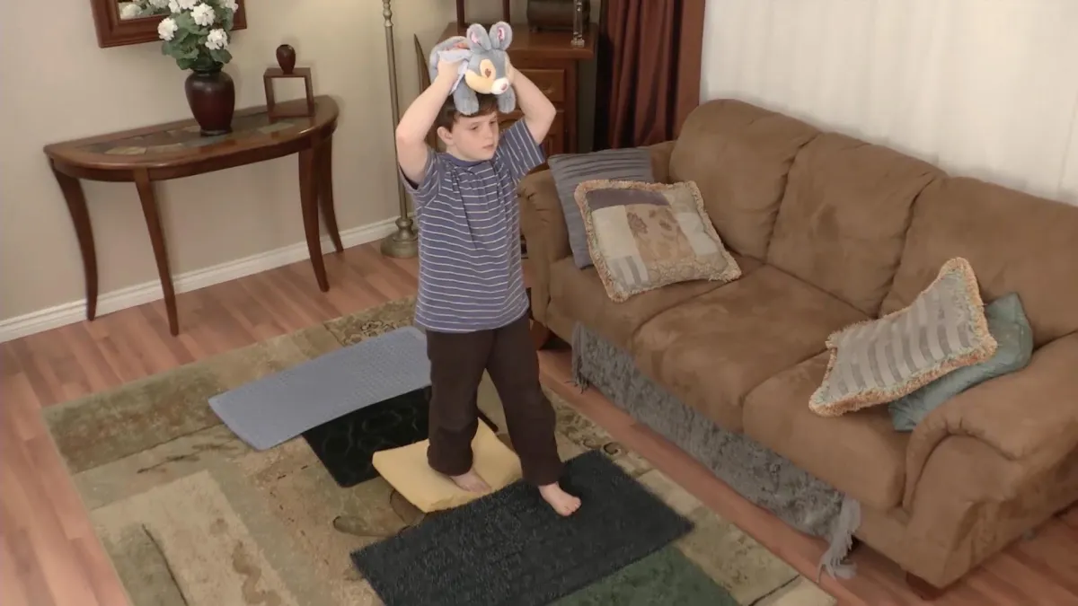 Sensory Enrichment Therapy Game Sample: Multitexture Path Holding a Teddy Bear