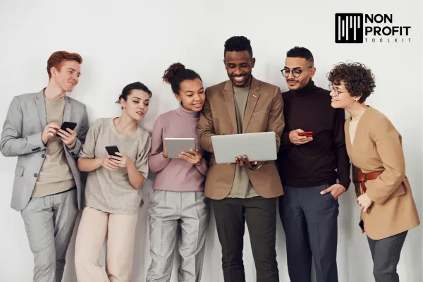 Group of People Looking at Laptop Screen