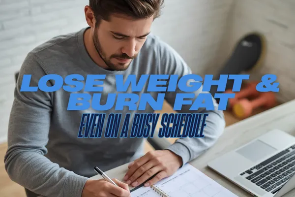 Person scheduling workouts on a busy calendar, planning fitness and weight loss goals despite a hectic lifestyle.