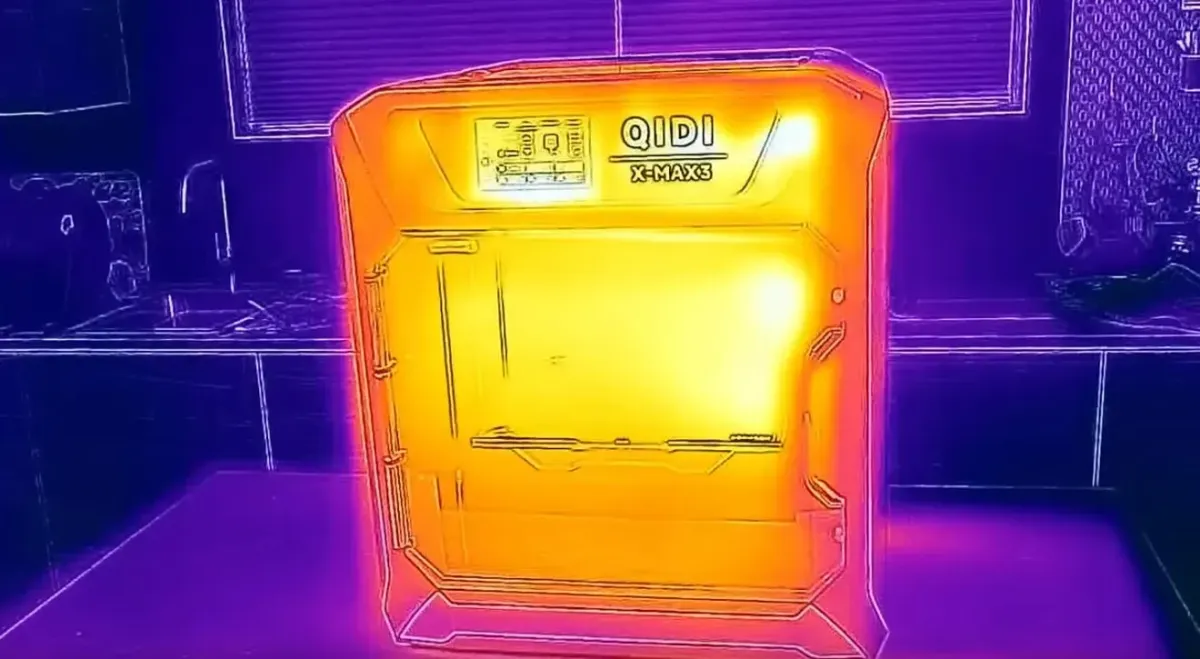 Thermal image of a 3D printer enclosure showing heat distribution inside a heated chamber